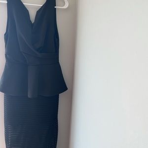 Amazing cocktail dress in black- size medium and great brand